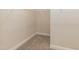 Walk-in closet with carpet flooring and wire shelving for optimal storage and organization at 587 Glenkirk Pl, Garner, NC 27529