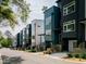 Modern townhomes feature clean lines, large windows, and landscaped front yards, perfect for urban living at 612 Rocky Knob Ct, Raleigh, NC 27601