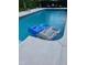 Refreshing pool with floating rafts and lounge chairs at 64 Inlet Cir, Kenly, NC 27542