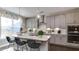 Modern kitchen with ample counter space and stainless steel appliances at 921 Jasper Mine Trl, Raleigh, NC 27610