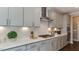Kitchen with a gas cooktop and light gray cabinetry at 921 Jasper Mine Trl, Raleigh, NC 27610