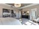 This main bedroom features a neutral palette, modern decor, and beautiful natural light at 921 Jasper Mine Trl, Raleigh, NC 27610