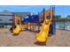 Colorful community playground with slides and climbing structures, perfect for Gathering fun and recreation at 921 Jasper Mine Trl, Raleigh, NC 27610