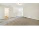 Spacious bedroom with neutral colors and large doorway leading to walk-in closet at 243 Kissington Way, Benson, NC 27504
