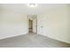 Bedroom with neutral tones, carpeted floor, and closet at 243 Kissington Way, Benson, NC 27504