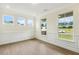 Bright living room with ample natural light and elegant moldings at 243 Kissington Way, Benson, NC 27504