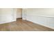 Spacious room with hardwood floors and elegant French doors at 243 Kissington Way, Benson, NC 27504