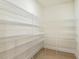 Walk-in pantry with wire shelving at 243 Kissington Way, Benson, NC 27504