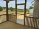The screen porch offers a relaxing outdoor space with natural light at 243 Kissington Way, Benson, NC 27504