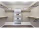 Organized walk-in closet with shelving and clothing racks at 2526 Snowdrop Ct, Apex, NC 27502
