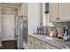 Well-equipped kitchen with stainless steel appliances and lots of cabinets at 2526 Snowdrop Ct, Apex, NC 27502