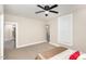Large bedroom with neutral paint, carpeting, and ceiling fan at 334 E Andrews Ave, Henderson, NC 27536