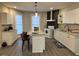 Spacious eat-in kitchen featuring a large island, stainless appliances, and stylish finishes at 334 E Andrews Ave, Henderson, NC 27536