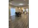 Open floorplan view of living area with dining and kitchen at 334 E Andrews Ave, Henderson, NC 27536