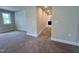 Bedroom with carpet, neutral walls, white trim, and an ensuite bathroom down the hall at 367 Duncan Creek Rd # 129, Lillington, NC 27546
