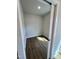 Walk-in closet featuring hardwood flooring and ample space for storage at 367 Duncan Creek Rd # 129, Lillington, NC 27546