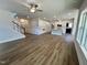 Spacious open floor plan features staircase, living room and white kitchen at 367 Duncan Creek Rd # 129, Lillington, NC 27546