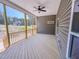 Screened in back porch with wood flooring and siding at 403 Duncan Creek Rd # 131, Lillington, NC 27546
