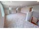 Large bonus room upstairs features carpet flooring and neutral colored walls and ceilings at 403 Duncan Creek Rd # 131, Lillington, NC 27546