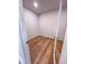 Unfinished closet with hardwood floors and ample storage at 403 Duncan Creek Rd # 131, Lillington, NC 27546