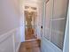 Inviting foyer with wood-look floors and detailed trim, showcasing the home's bright and open floor plan at 403 Duncan Creek Rd # 131, Lillington, NC 27546