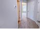 Upstairs hallway featuring neutral carpeting and access to rooms at 403 Duncan Creek Rd # 131, Lillington, NC 27546