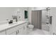 Clean bathroom with a shower, bathtub combo, a light-colored countertop, and vanity at 702 Portia Way, Homesite 16, Morrisville, NC 27560
