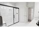 Stylish bathroom with a glass shower, walk-in closet, and modern fixtures at 702 Portia Way, Homesite 16, Morrisville, NC 27560
