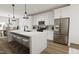 Beautiful kitchen with a large center island, stainless steel appliances, and white cabinetry at 704 Portia Way, Homesite 15, Morrisville, NC 27560