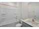 Bathroom with a shower and tub combination, white tile, and a white vanity at 1128 Middlecrest Dr, Rocky Mount, NC 27804