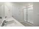 A bathroom featuring a double sink vanity with lots of counter space and a stand-up shower at 1128 Middlecrest Dr, Rocky Mount, NC 27804