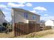 Exterior view of house with fenced backyard at 2248 Ventana Ln, Raleigh, NC 27604