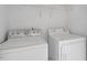 Laundry room with standard white washer and dryer hookups at 2248 Ventana Ln, Raleigh, NC 27604