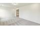Spacious bedroom features neutral carpet, a walk-in closet and ample natural light at 261 Kissington Way, Benson, NC 27504