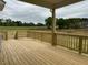 Features a wooden deck overlooking trees and a landscape at 261 Kissington Way, Benson, NC 27504