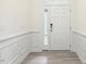 Clean, well-lit entryway with white trim and wood-look flooring at 261 Kissington Way, Benson, NC 27504