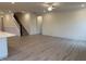 Spacious living room featuring a staircase and hardwood floors at 261 Kissington Way, Benson, NC 27504