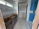 A bath in progress with a vanity and access to separate room at 303 Chesapeake Cmns St # 99, Garner, NC 27529