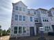 New construction home featuring large windows and modern design elements at 303 Chesapeake Cmns St # 99, Garner, NC 27529