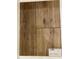 Close-up of luxury vinyl flooring featuring a realistic wood grain and durable construction at 303 Chesapeake Cmns St # 99, Garner, NC 27529