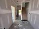 Interior view of unfinished home showing stairwell and other details in progress at 303 Chesapeake Cmns St # 99, Garner, NC 27529