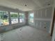 Sunny bedroom with large windows providing ample natural light and neighborhood views at 303 Chesapeake Commons St # 99, Garner, NC 27529