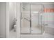 Elegant bathroom with a walk-in shower and a large, jetted bathtub at 4701 Regalwood Dr, Raleigh, NC 27613