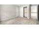 Neutral bedroom featuring plush carpeting, a closet, and an accessible doorway at 4701 Regalwood Dr, Raleigh, NC 27613