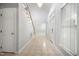 Bright foyer with tile flooring, stairs, high ceilings, and access to other rooms in the house at 4701 Regalwood Dr, Raleigh, NC 27613