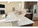 Granite countertop kitchen with stainless steel appliances and breakfast bar at 5514 Jessip St, Morrisville, NC 27560