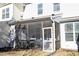 Screened porch, attached to the house, with seating at 5514 Jessip St, Morrisville, NC 27560