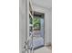 Modern home entryway with a glass-paneled door at 1000 Addison Pl # 101, Raleigh, NC 27610