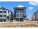 New construction townhomes showcase modern architecture and convenient garage parking at 1000 Addison Pl # 101, Raleigh, NC 27610