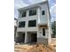New construction townhomes under development, feature modern design and garage parking at 1000 Addison Pl # 101, Raleigh, NC 27610